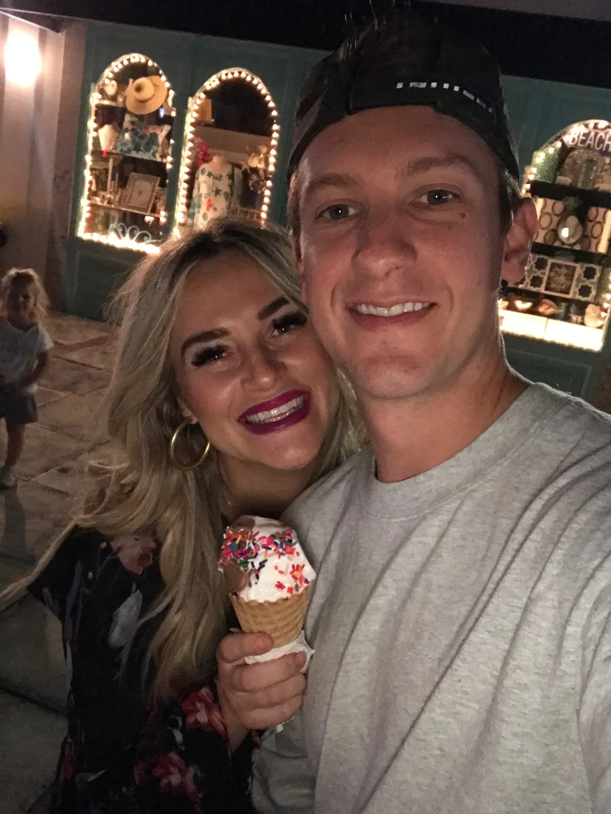 A gelato-night selfie outside the arched windows of an island ice-cream shop